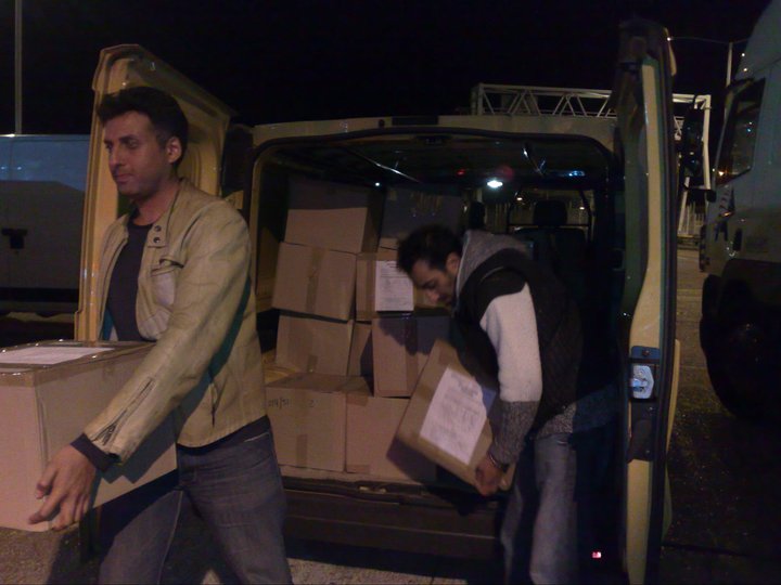 MCC volunteers loading MCC life boxes.